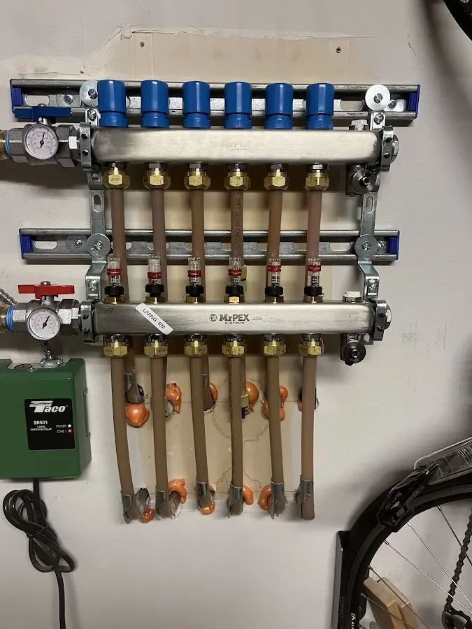 Plumber performing Sink Repair at a residential property in Larchmont